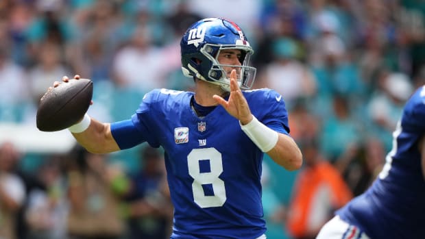 Oct 8, 2023; Miami Gardens, Florida, USA; New York Giants quarterback Daniel Jones (8) attempts a pass agianst the Miami Dolphins during the first half at Hard Rock Stadium.